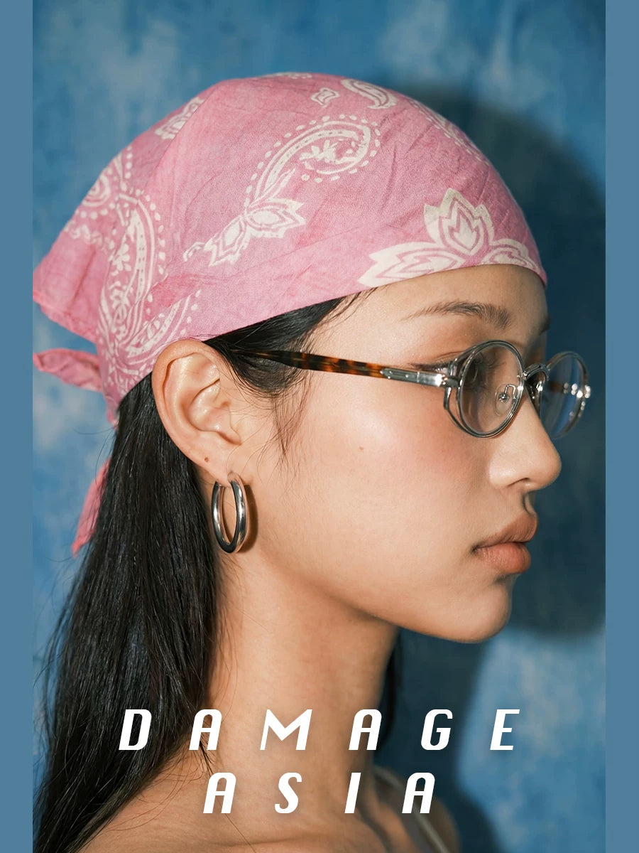 Round Metal Clear-Lens Glasses — Side view of model wearing round clear-lens metal glasses with pink bandana