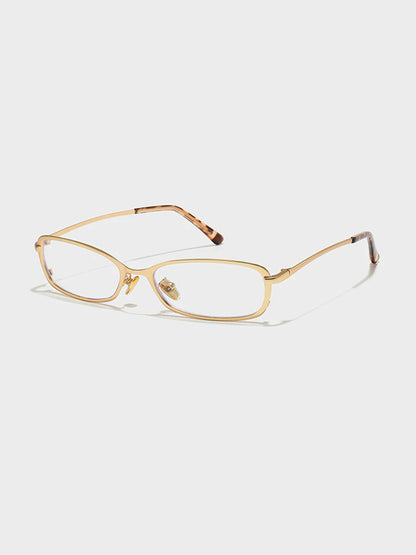 Slim Rectangular Metal-Frame Glasses — Gold-tone frame with clear lenses, three-quarter view