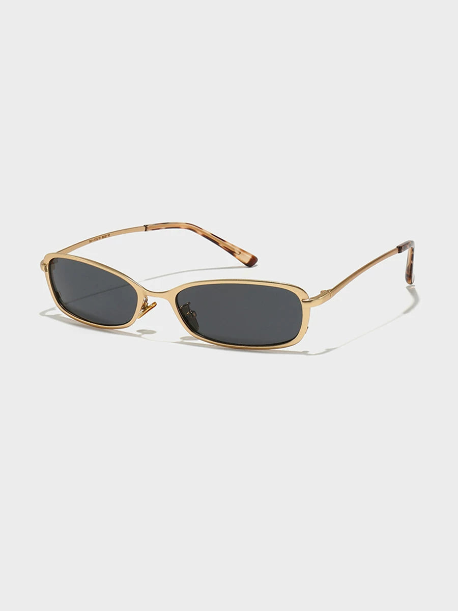 Slim Rectangular Metal-Frame Glasses — Gold-tone frame with dark lenses, three-quarter view