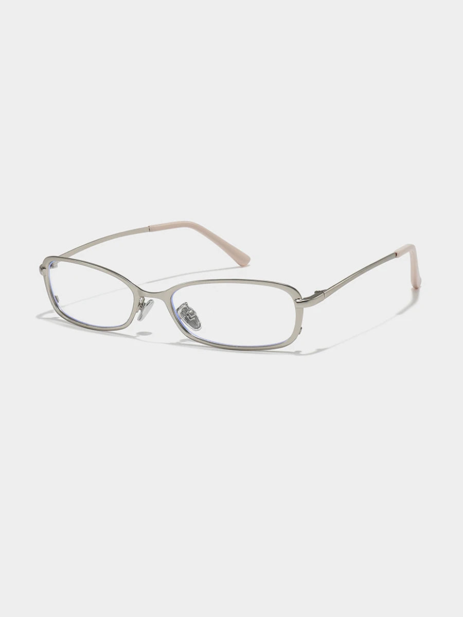 Slim Rectangular Metal-Frame Glasses — Silver-tone frame with clear lenses, three-quarter view