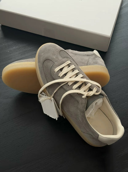 Suede Leather German Trainer Sneakers — grey suede pair showing gum sole