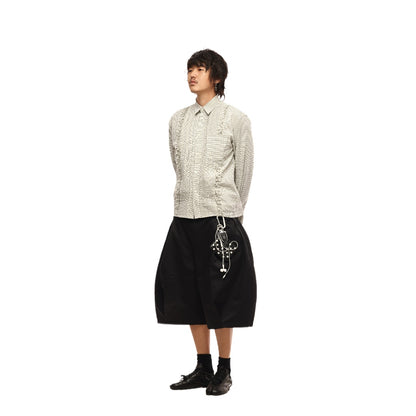 Tabi split toe sneakers worn with minimalist outfit