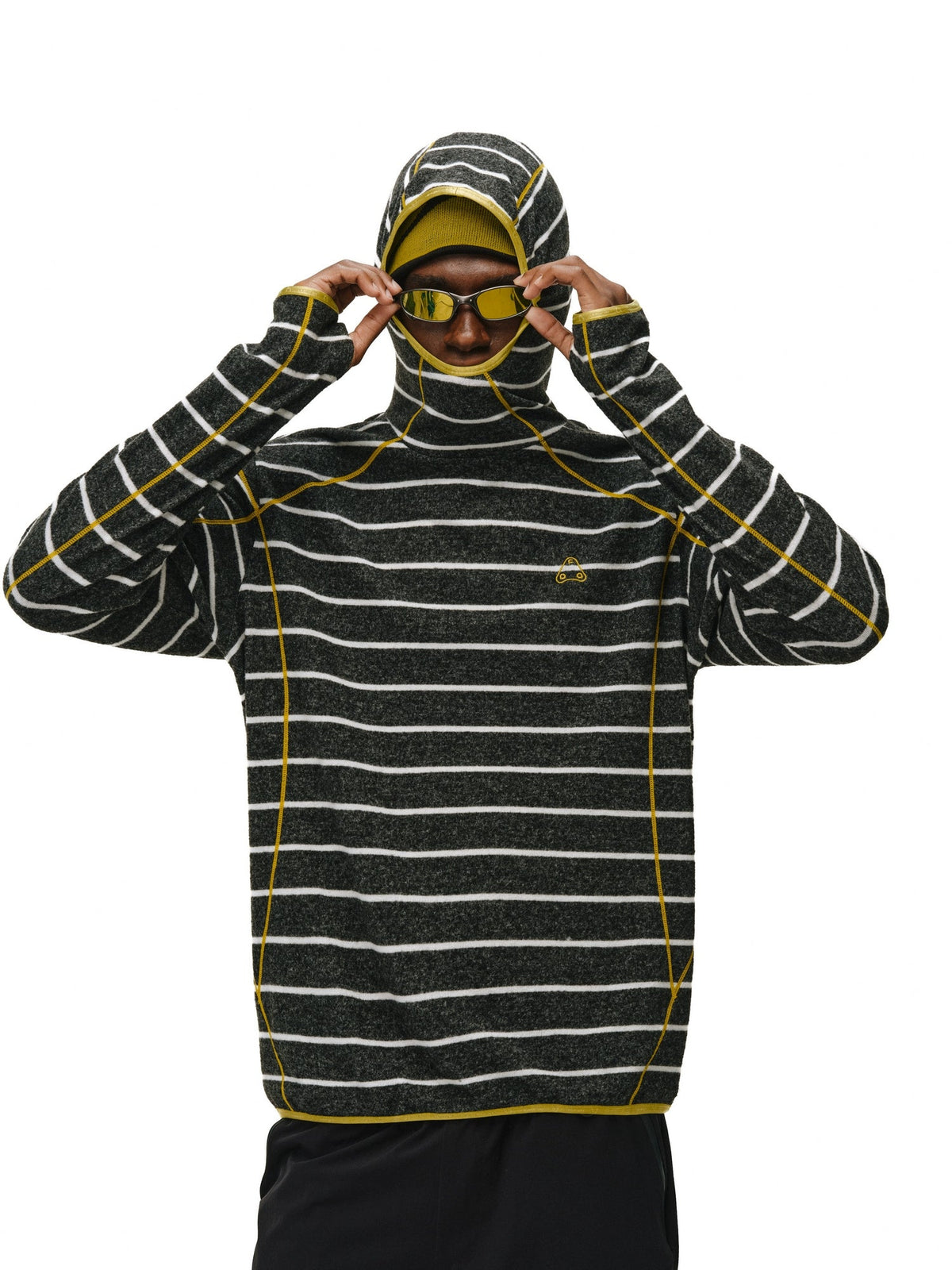 The EastLyst Textured Stripe Knit Hoodie, featuring black horizontal stripes and white seam details in a relaxed fit, is displayed laid flat on a white background.