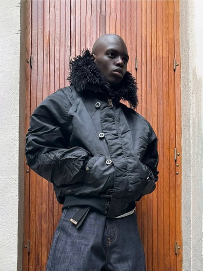 Tie-Dye Bomber Jacket — Model wearing black jacket outdoors