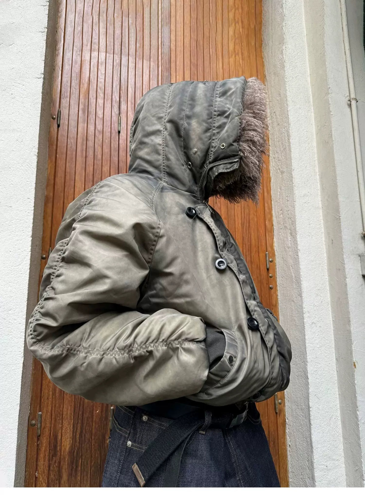 Tie-Dye Bomber Jacket — Model wearing khaki jacket with collar raised, side view