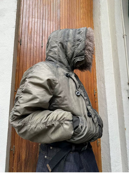 Tie-Dye Bomber Jacket — Model wearing khaki jacket with collar raised, side view