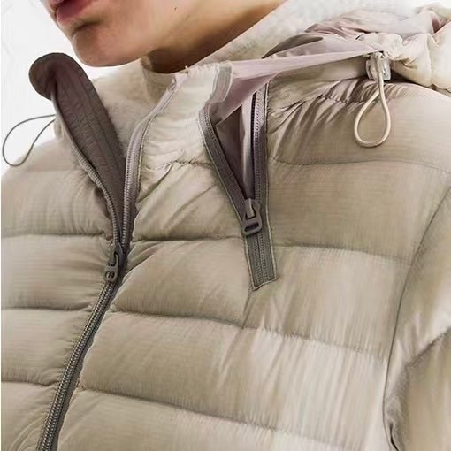 Men's women's puffer jacket light color - ultra light down hooded winter coat close up detail