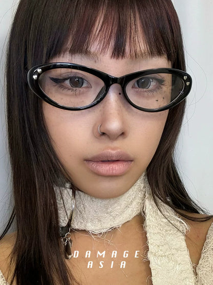 Upswept Cat-Eye Clear-Lens Glasses — Model wearing black clear-lens cat-eye glasses