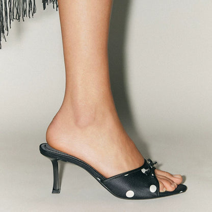 Women's Bow Open Toe High-Heel Mule Sandals — black polka-dot mule worn, close-up