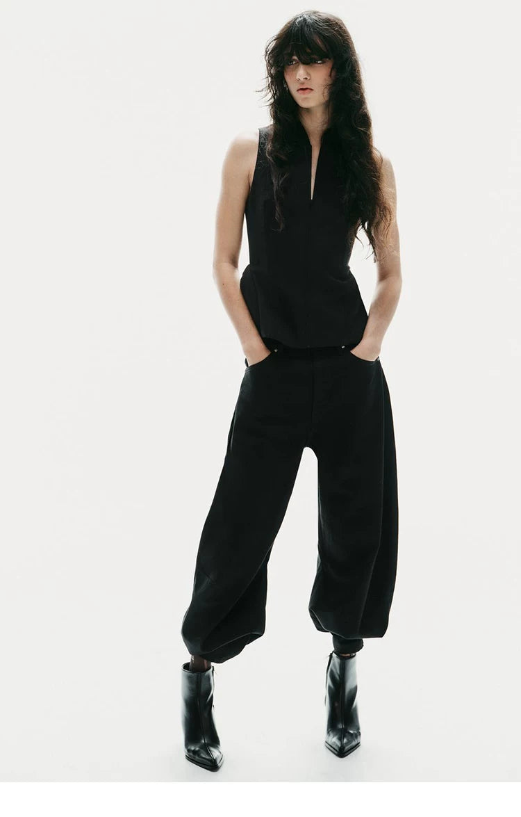 Women's Leather Square Toe Western Ankle Boots — model wearing black ankle boots with jumpsuit