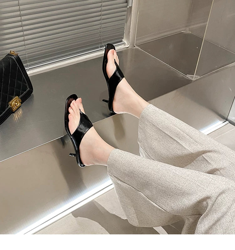 Women's Square Toe Mid-Heel Thong Slide Sandals — black thong mule worn, close-up