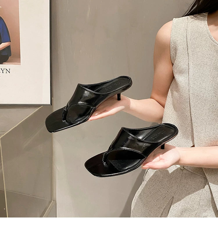 Women's Square Toe Mid-Heel Thong Slide Sandals — black thong pair held in hands
