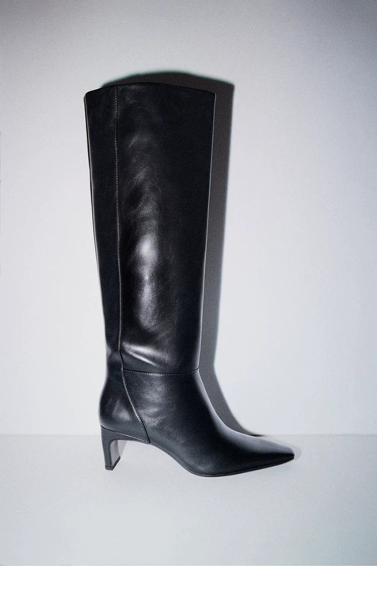 Women's Square Toe Sculptural Heel Knee-High Boots — black pair, side view on grey background