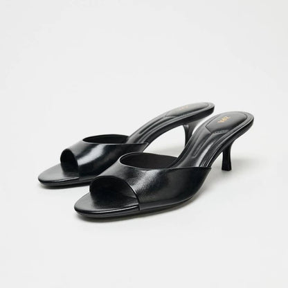 Women's Stiletto Heel Mule Slide Sandals — black mule pair, front angle