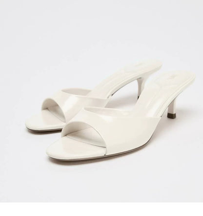Women's Stiletto Heel Mule Slide Sandals — cream mule pair, front angle