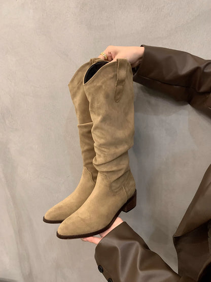 Women's V-Cut Western Knee-High Boots — beige boot held in hand, side view