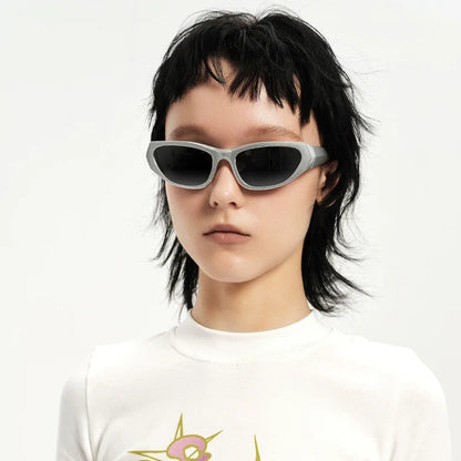 Y2K Angular Wraparound Sunglasses — Model wearing silver wraparound sunglasses